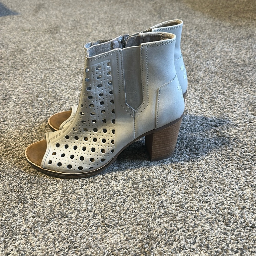 Heeled peep toe booties
